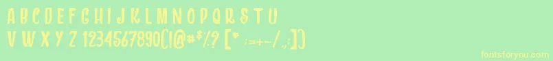 フォントDragonsAndChickens – 黄色の文字が緑の背景にあります