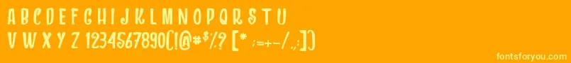 フォントDragonsAndChickens – オレンジの背景に黄色の文字