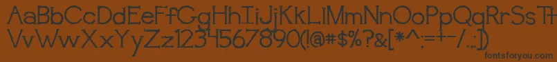 BmdAwakening Font – Black Fonts on Brown Background
