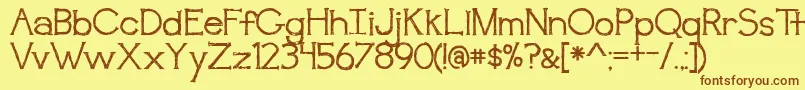 BmdAwakening Font – Brown Fonts on Yellow Background