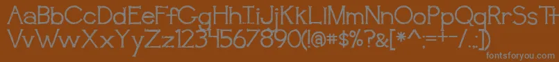 BmdAwakening Font – Gray Fonts on Brown Background