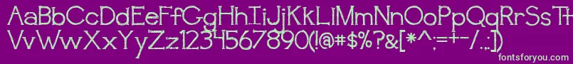 BmdAwakening Font – Green Fonts on Purple Background