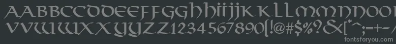 フォントThongRegularDb – 黒い背景に灰色の文字