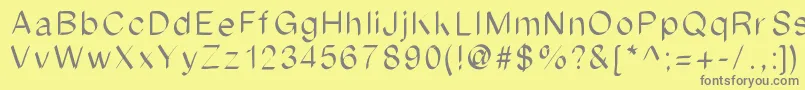 Fonte Ipadfont – fontes cinzas em um fundo amarelo