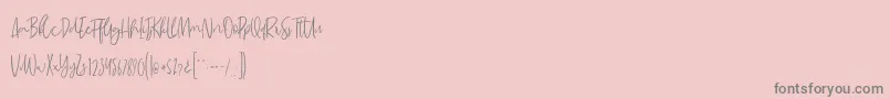 Saiba mais sobre a fonte MadeleineDemo Fonte MadeleineDemo – fontes cinzas em um fundo rosa