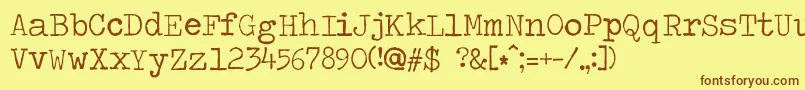 Travelingtypewriter Font – Brown Fonts on Yellow Background