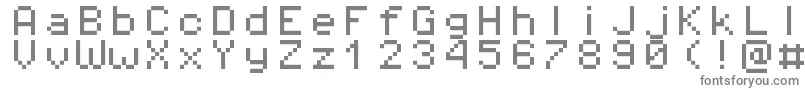 Pixeloperatormono8-fontti – harmaat kirjasimet valkoisella taustalla