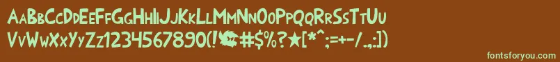 フォントOnomatoshark – 緑色の文字が茶色の背景にあります。
