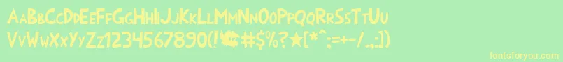 Onomatoshark Font – Yellow Fonts on Green Background