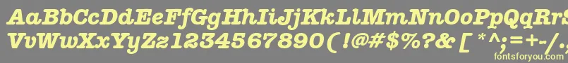 AmericantypitcteebolItalic Font – Yellow Fonts on Gray Background