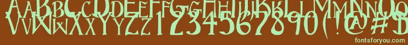フォントBruceStandardText – 緑色の文字が茶色の背景にあります。