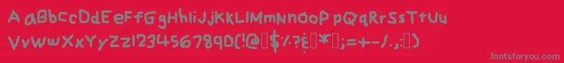 Fonte ZehksHandwriting – fontes cinzas em um fundo vermelho