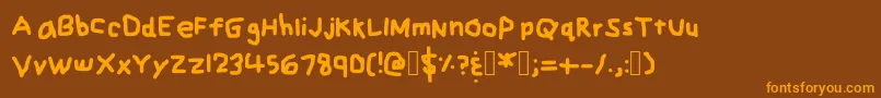 ZehksHandwriting Font – Orange Fonts on Brown Background