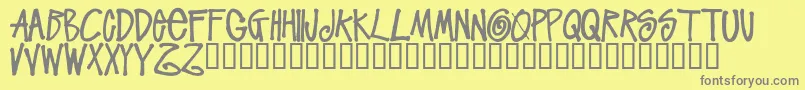 フォントStussyscriptRegular – 黄色の背景に灰色の文字