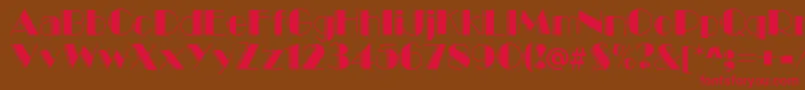 MarqueeEngravedRegular Font – Red Fonts on Brown Background