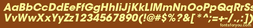 ItcavantgardestdBoldobl-fontti – keltaiset fontit ruskealla taustalla