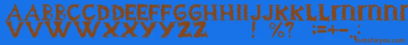 フォントBlackgrapesRegular – 茶色の文字が青い背景にあります。
