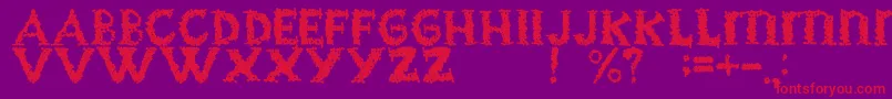 Czcionka BlackgrapesRegular – czerwone czcionki na fioletowym tle