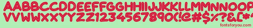 CuteStitch Font – Red Fonts on Green Background