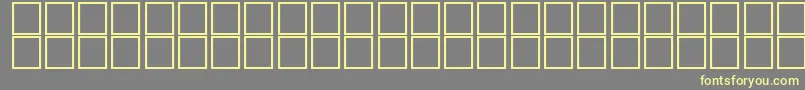 McsElectronSUNormal. Font – Yellow Fonts on Gray Background