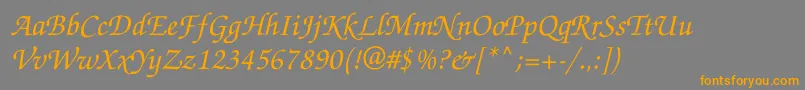 フォントZpf56C – オレンジの文字は灰色の背景にあります。