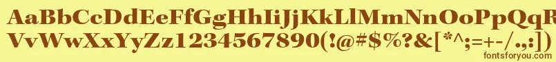 フォントKeplerstdBlackextsubh – 茶色の文字が黄色の背景にあります。