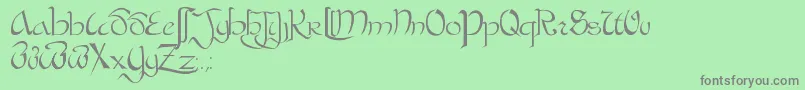 フォントBastardaPlain. – 緑の背景に灰色の文字