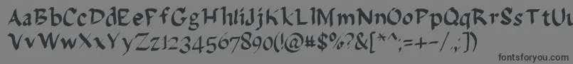 Delagarza-Schriftart – Schwarze Schriften auf grauem Hintergrund