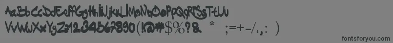 Dakinizazi-Schriftart – Schwarze Schriften auf grauem Hintergrund