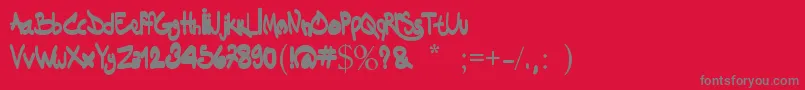 Dakinizazi-fontti – harmaat kirjasimet punaisella taustalla