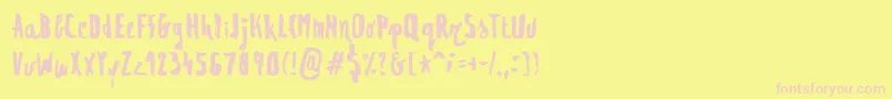 Regolith1-Schriftart – Rosa Schriften auf gelbem Hintergrund