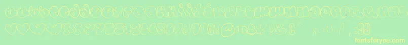Czcionka SomeBubbles – żółte czcionki na zielonym tle