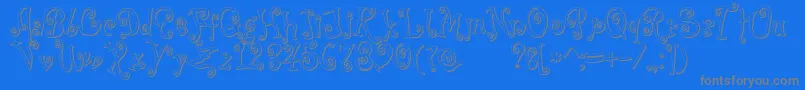フォントCoprsscriptShadow – 青い背景に灰色の文字