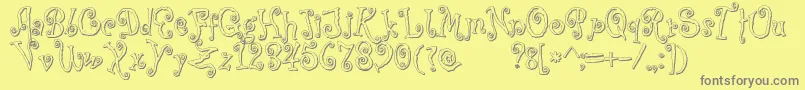 フォントCoprsscriptShadow – 黄色の背景に灰色の文字