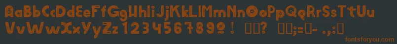 AmvinylHeavy Font – Brown Fonts on Black Background