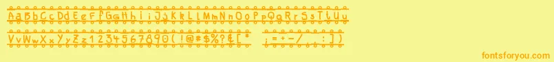 FeBanner Font – Orange Fonts on Yellow Background