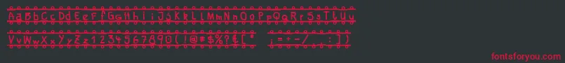FeBanner Font – Red Fonts on Black Background