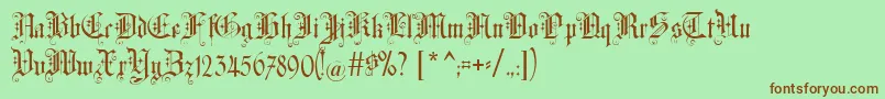 フォントAltgotisch – 緑の背景に茶色のフォント