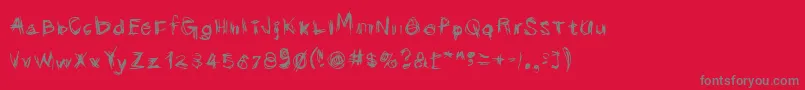 Scribbli-Schriftart – Graue Schriften auf rotem Hintergrund