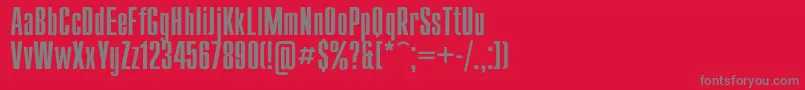 Compact-fontti – harmaat kirjasimet punaisella taustalla