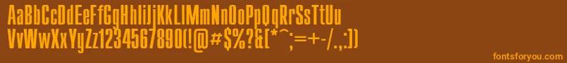 フォントCompact – オレンジ色の文字が茶色の背景にあります。