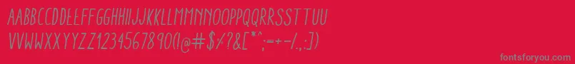 Police AracneCondensedRegularItalic – polices grises sur fond rouge