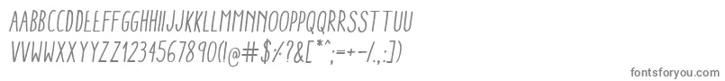 フォントAracneCondensedRegularItalic – 白い背景に灰色の文字