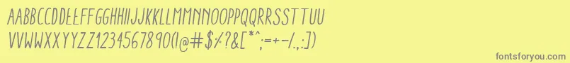 AracneCondensedRegularItalic Font – Gray Fonts on Yellow Background