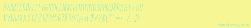 AracneCondensedRegularItalic Font – Green Fonts on Yellow Background