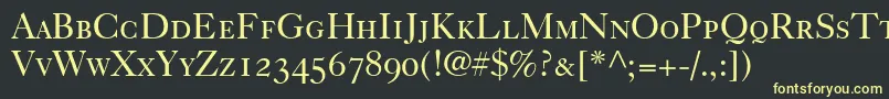 フォントCaslon540RomanSmallCapsOldstyleFigures – 黒い背景に黄色の文字