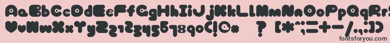 TokyoHoneyChan-Schriftart – Schwarze Schriften auf rosa Hintergrund