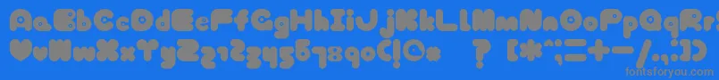 TokyoHoneyChan-fontti – harmaat kirjasimet sinisellä taustalla