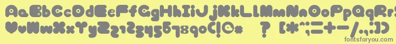 フォントTokyoHoneyChan – 黄色の背景に灰色の文字