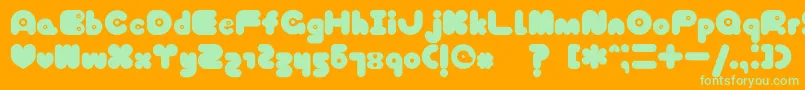 Шрифт TokyoHoneyChan – зелёные шрифты на оранжевом фоне